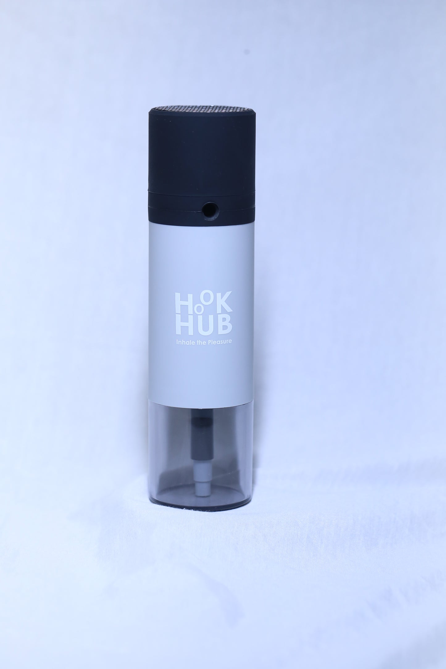 A silver HookHub portable hookah device with a black cap, perfect for elegant and minimalist settings.