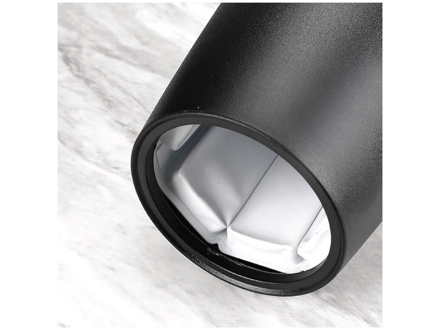 This black wine bottle chiller features a sleek design and insulated interior for efficient cooling.