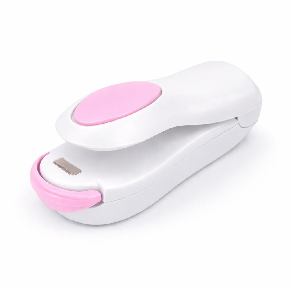 White handheld mini bag sealer with pink accents for resealing opened snack and food packages.